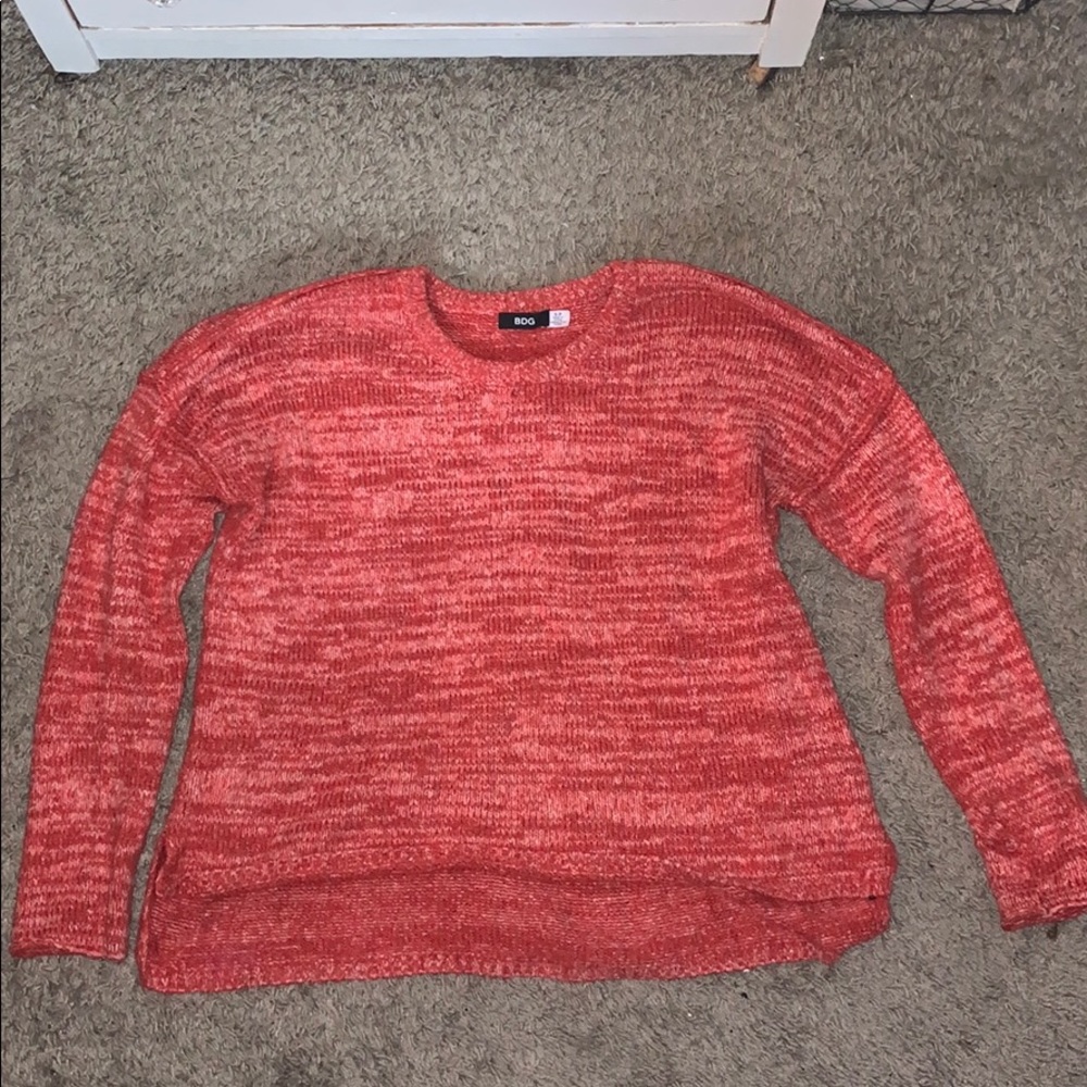 Red stitched sweater